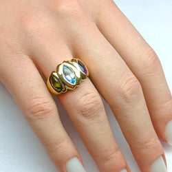 Trilogy Ring in yellow gold, with aquamarine, Peridot, and Amethyst