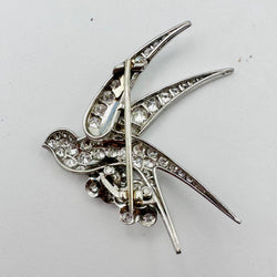 Brooch "Bird on two flowers" in white gold and Platinum