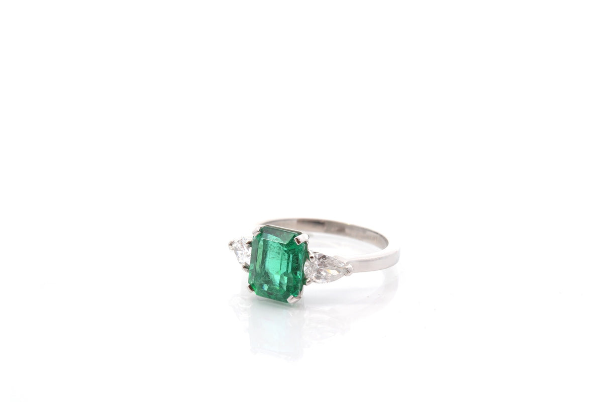 Trilogy Ring in Platinum, Emerald, and Diamonds