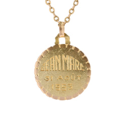 Medal in yellow gold and rose gold