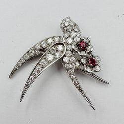Brooch "Bird on two flowers" in white gold and Platinum