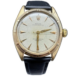 ROLEX "Oyster Perpetual 34" watch in yellow gold and leather