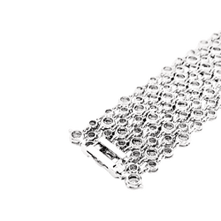 Bracelet souple, or blanc et diamants.