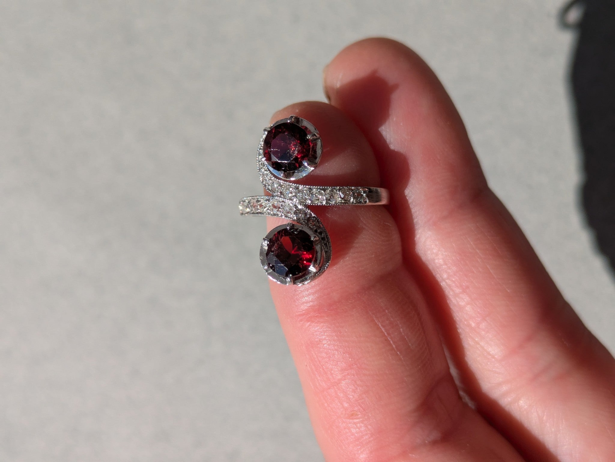 "Toi et Moi" Ring with 19th-Century Swirls, Garnets, Diamonds, and Platinum