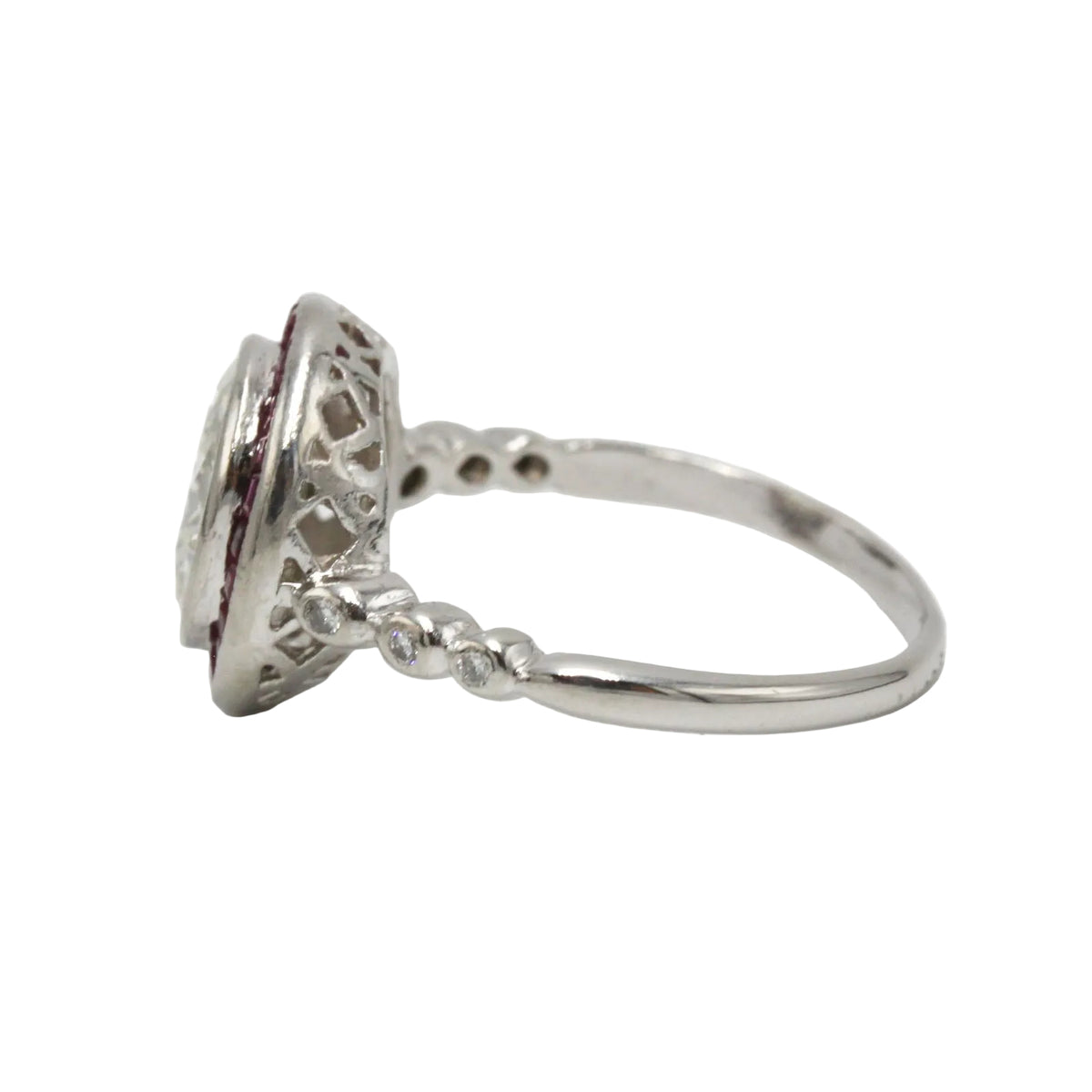 Entourage Ring in platinum, rubies, and diamonds