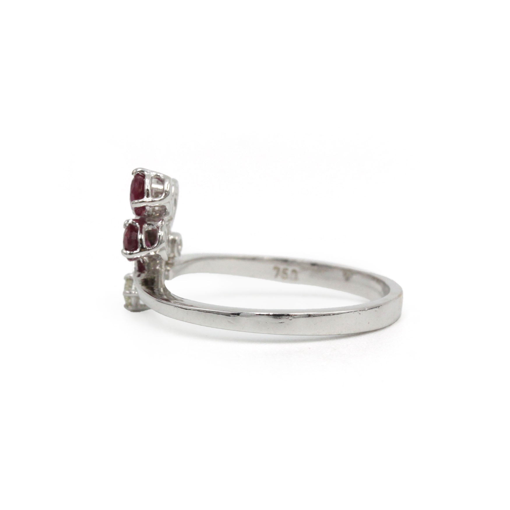 White gold ring with diamonds and rubies