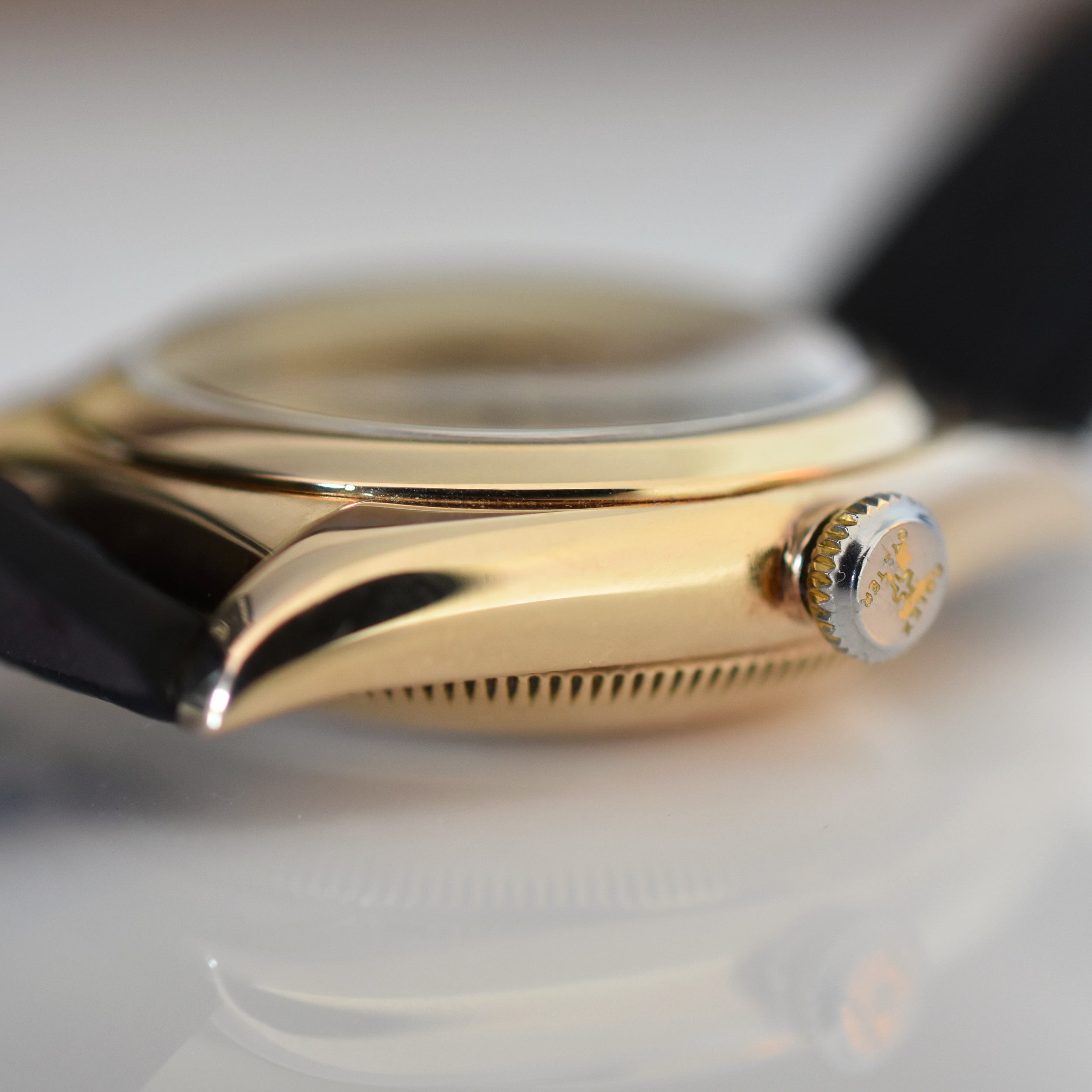 ROLEX "Oyster Perpetual Bubbleback Ovetto" watch in yellow gold and leather
