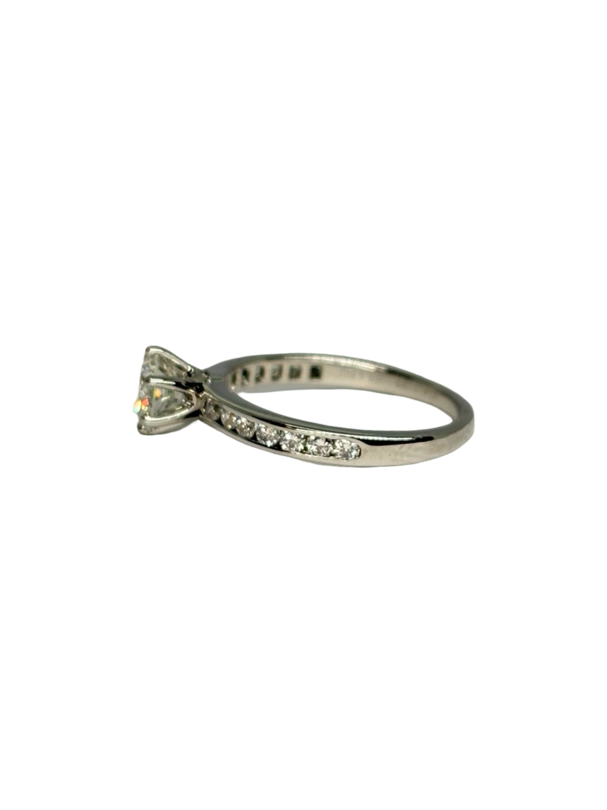 TIFFANY & CO. Solitaire Ring in Platinum and Diamonds