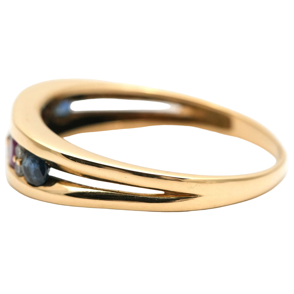 Yellow gold ring with emeralds, rubies, sapphires, and diamonds