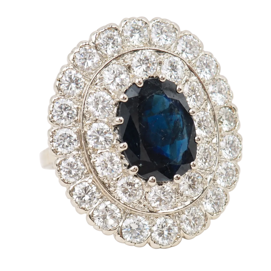 Pompadour Ring in white gold, yellow gold, sapphire, and diamonds