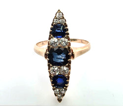 Bague Marquise en or jaune, saphirs et diamants