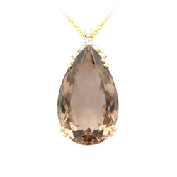 Yellow gold, quartz, and diamonds