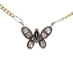 Necklace with a pendant in white gold, yellow gold, sapphire, and diamonds