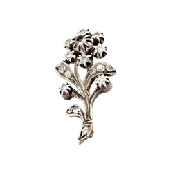 Brooch made of yellow gold, silver, sapphires, and diamonds