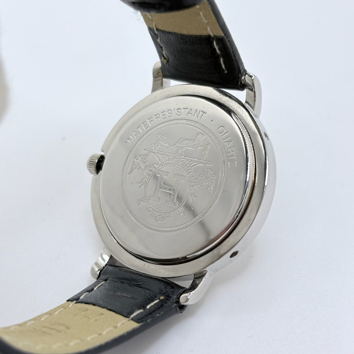 HERMÈS "Clipper" Watch in yellow gold, stainless steel, and leather