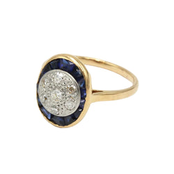 Ring in yellow gold, platinum, sapphires, and diamonds