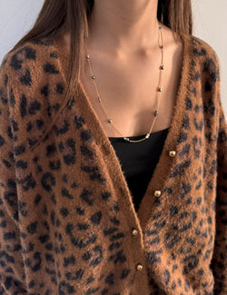 Rose gold long necklace with Tahitian pearls.