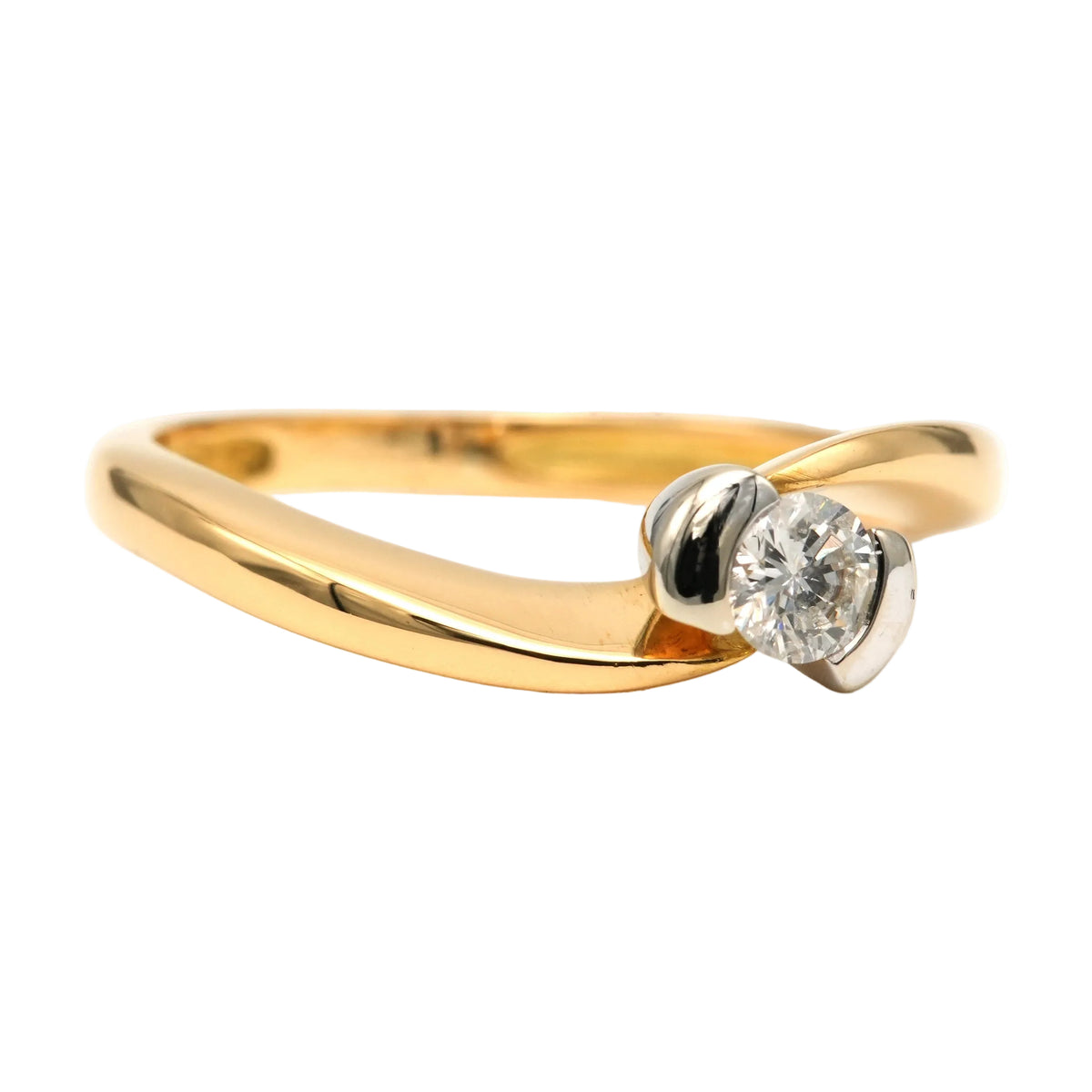 Solitaire Ring in White gold, Yellow gold, and Diamond