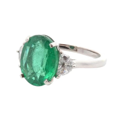 Trilogy Ring in Platinum, Emerald, and Diamonds