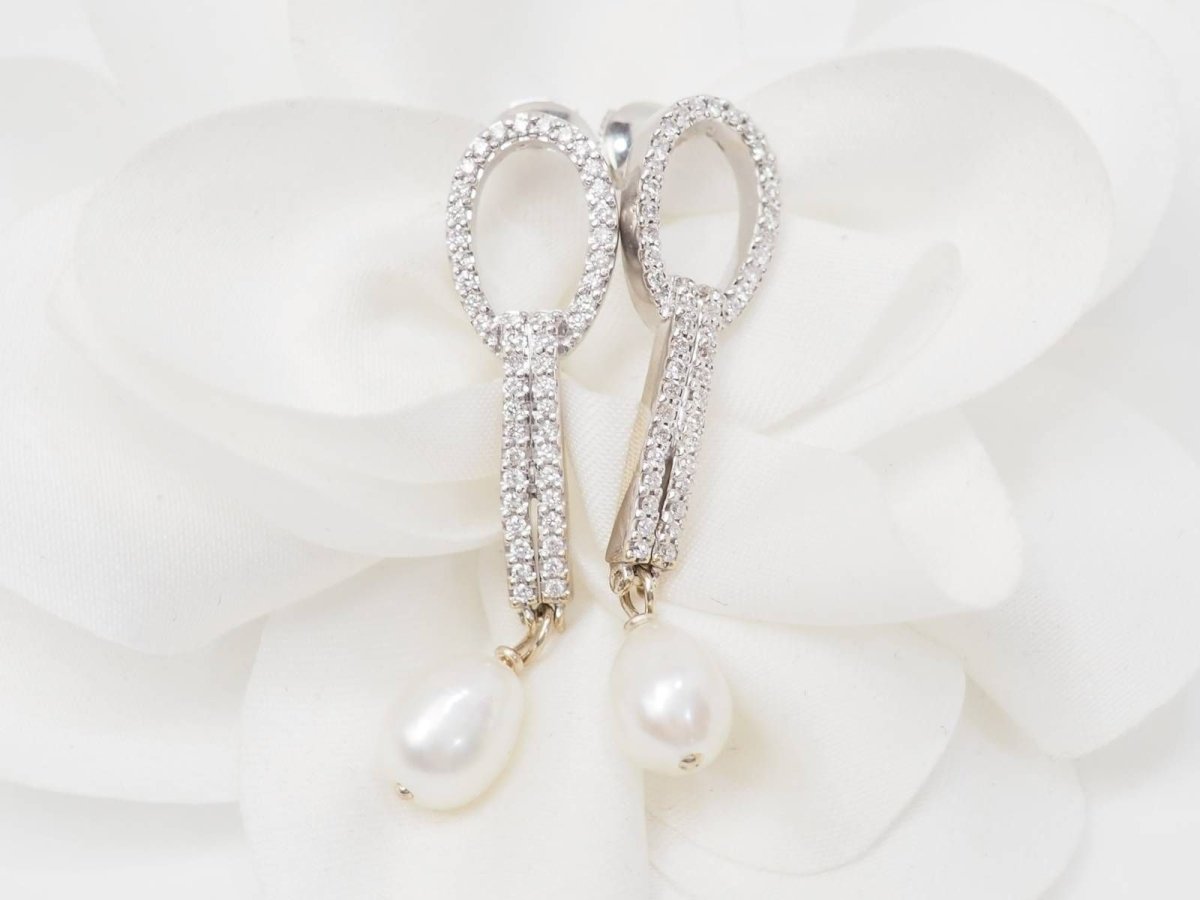 Boucles d'oreilles Pendantes en or blanc, perles et diamants