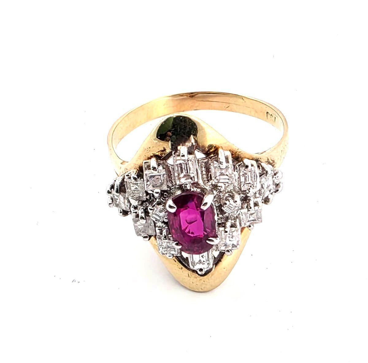 18-karat yellow gold ring with a central ruby and diamonds surrounding it