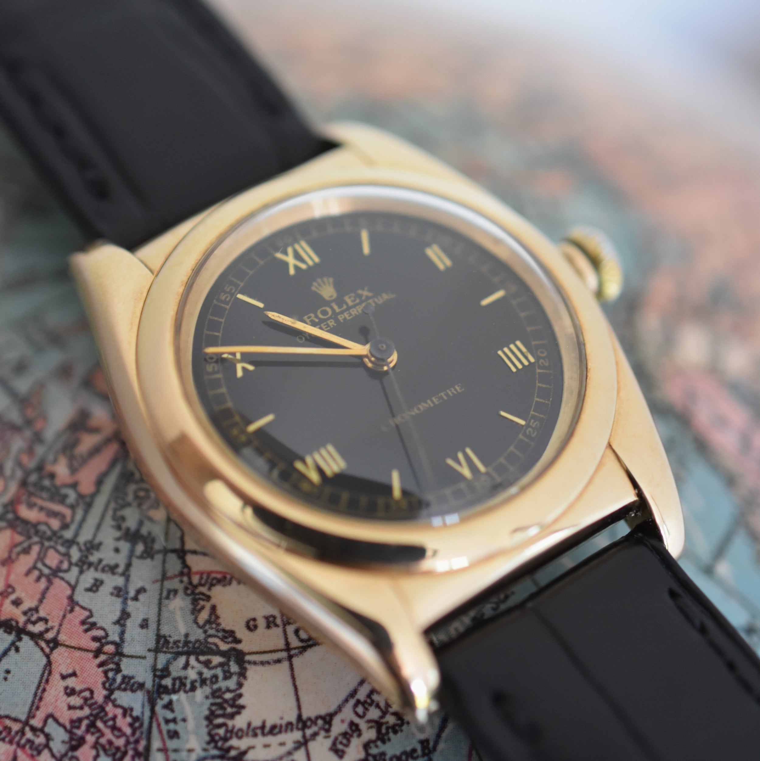 ROLEX "Oyster Perpetual Bubbleback Ovetto" watch in yellow gold and leather