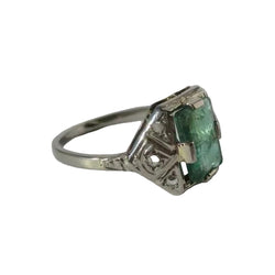 Art Deco ring in white gold, emerald, and diamonds