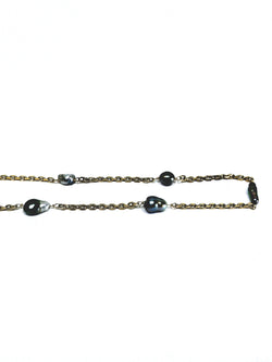 Rose gold long necklace with Tahitian pearls.