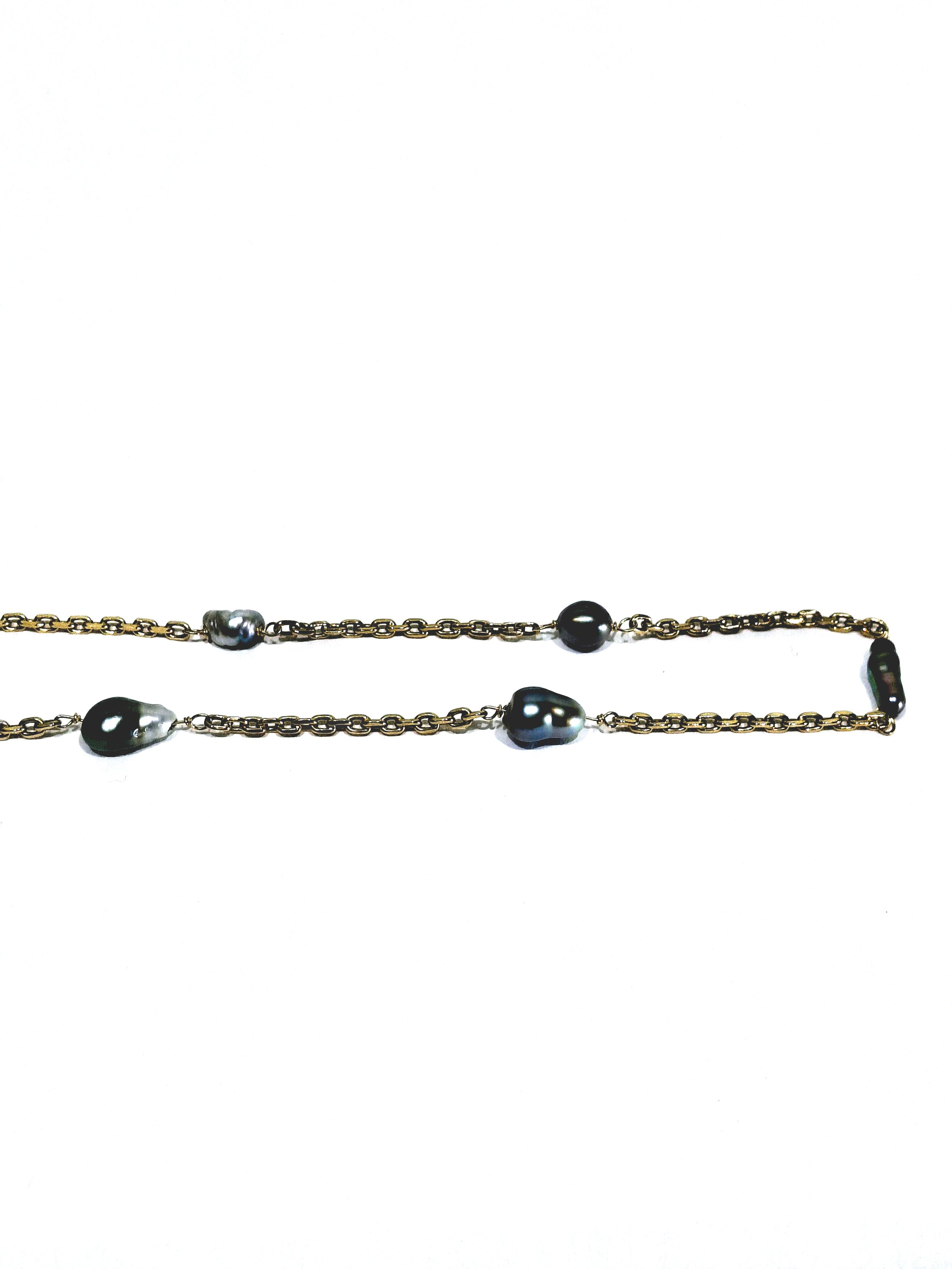 Rose gold long necklace with Tahitian pearls.