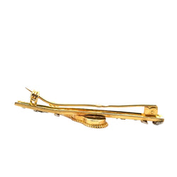 Brooch in yellow gold, white gold, and diamonds