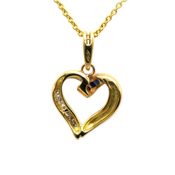 Yellow gold pendant with sapphires and diamonds