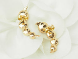 Boucles d’oreilles en or jaune et grenats