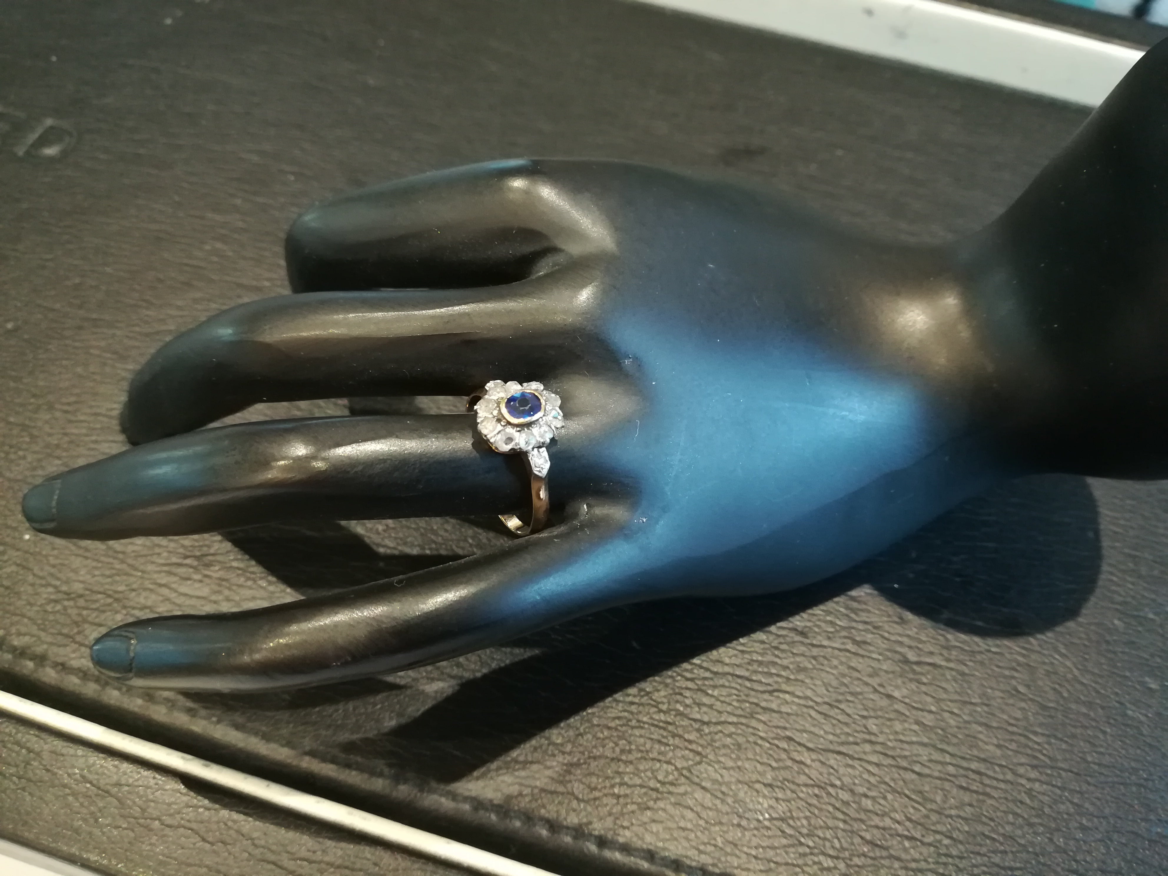 Ring in pink, paltinium, sapphire and diamonds.