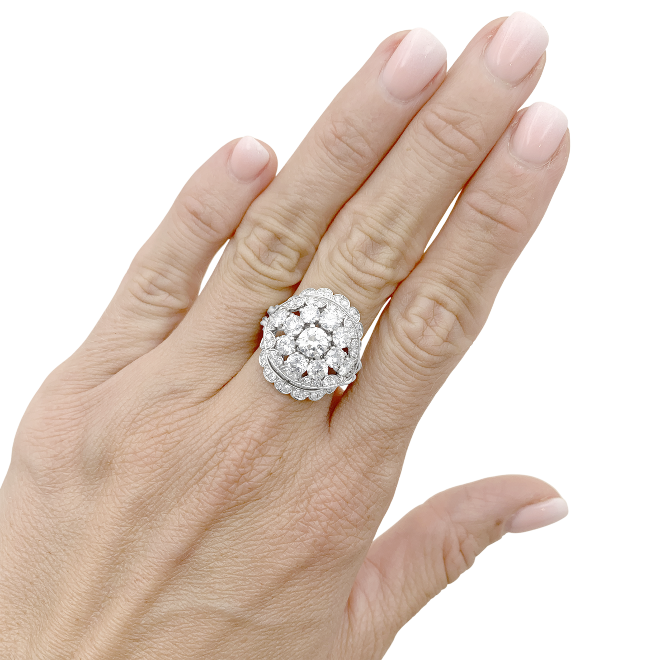 Bague fleur vintage en platine et diamants.