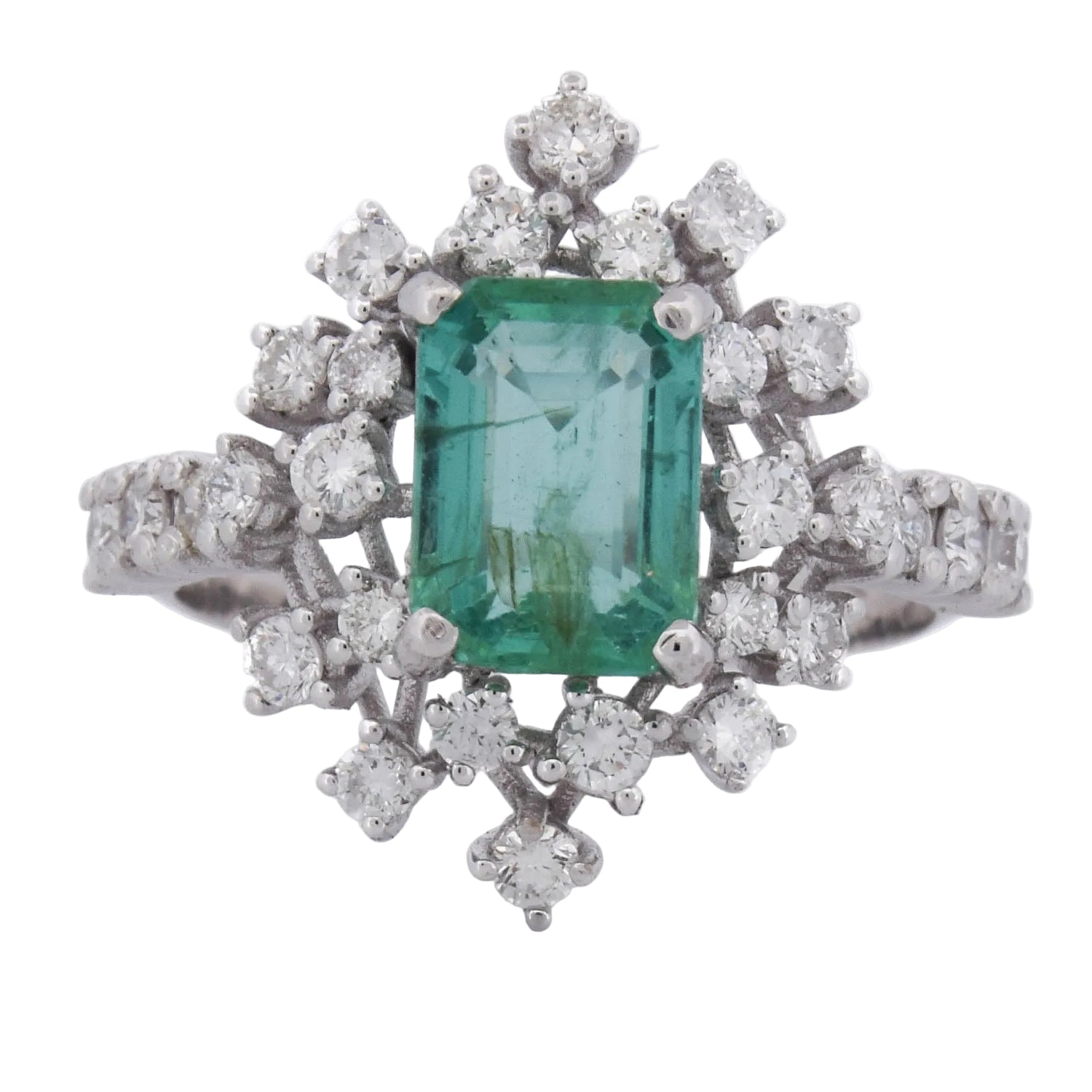 "Entourage" Ring in White Gold, Emerald, and Diamonds