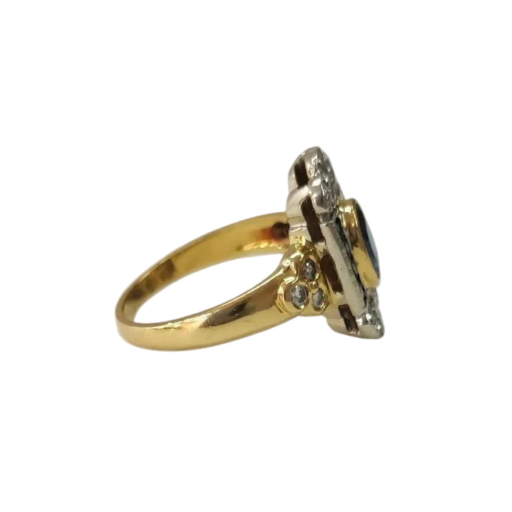 Ring in white gold, yellow gold, sapphires, and diamonds