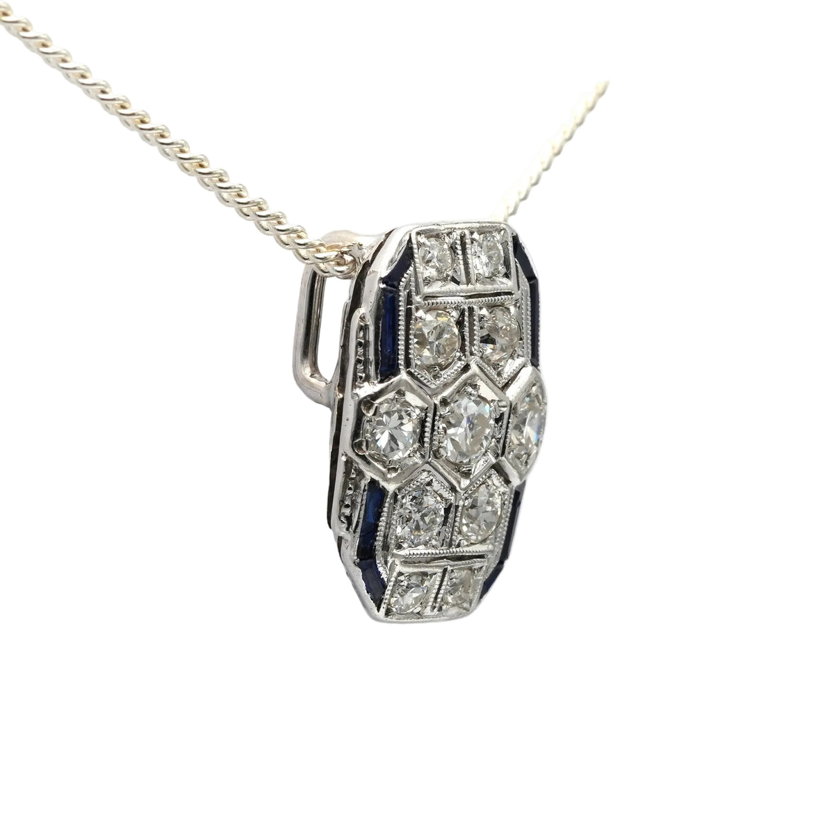 White gold pendant with sapphires and diamonds