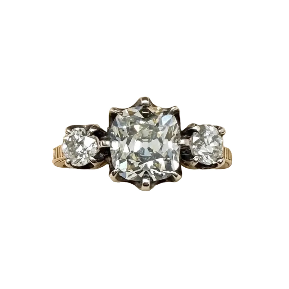 Trilogy Ring in Yellow Gold, Silver, and Diamonds