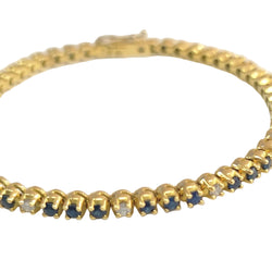 "Ligne" Bracelet in Yellow Gold, Sapphires, and Diamonds