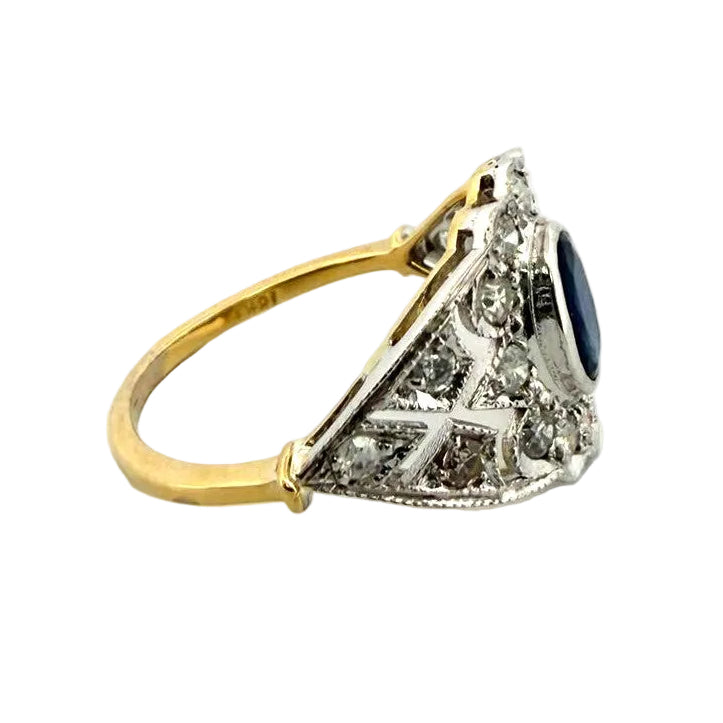 Entourage Ring in white gold, yellow gold, sapphire, and diamonds