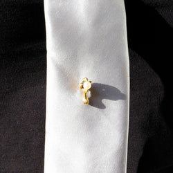 Yellow gold and pearl tie pin