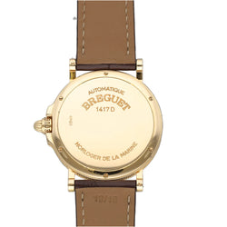 BREGUET watch in yellow gold and leather