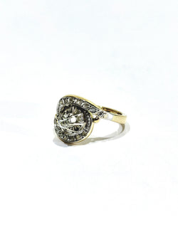 Tourbillon ring in yellow gold, white gold, and diamonds