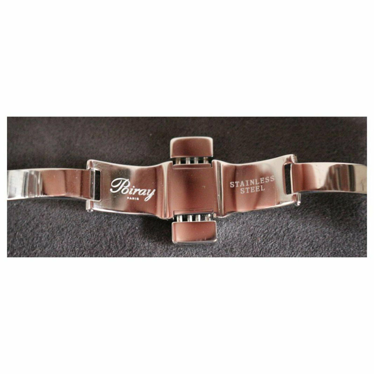 POIRAY "Ma Première Cuff Bracelet" watch in stainless steel, Mother-of-pearl, Quartz, and Diamonds