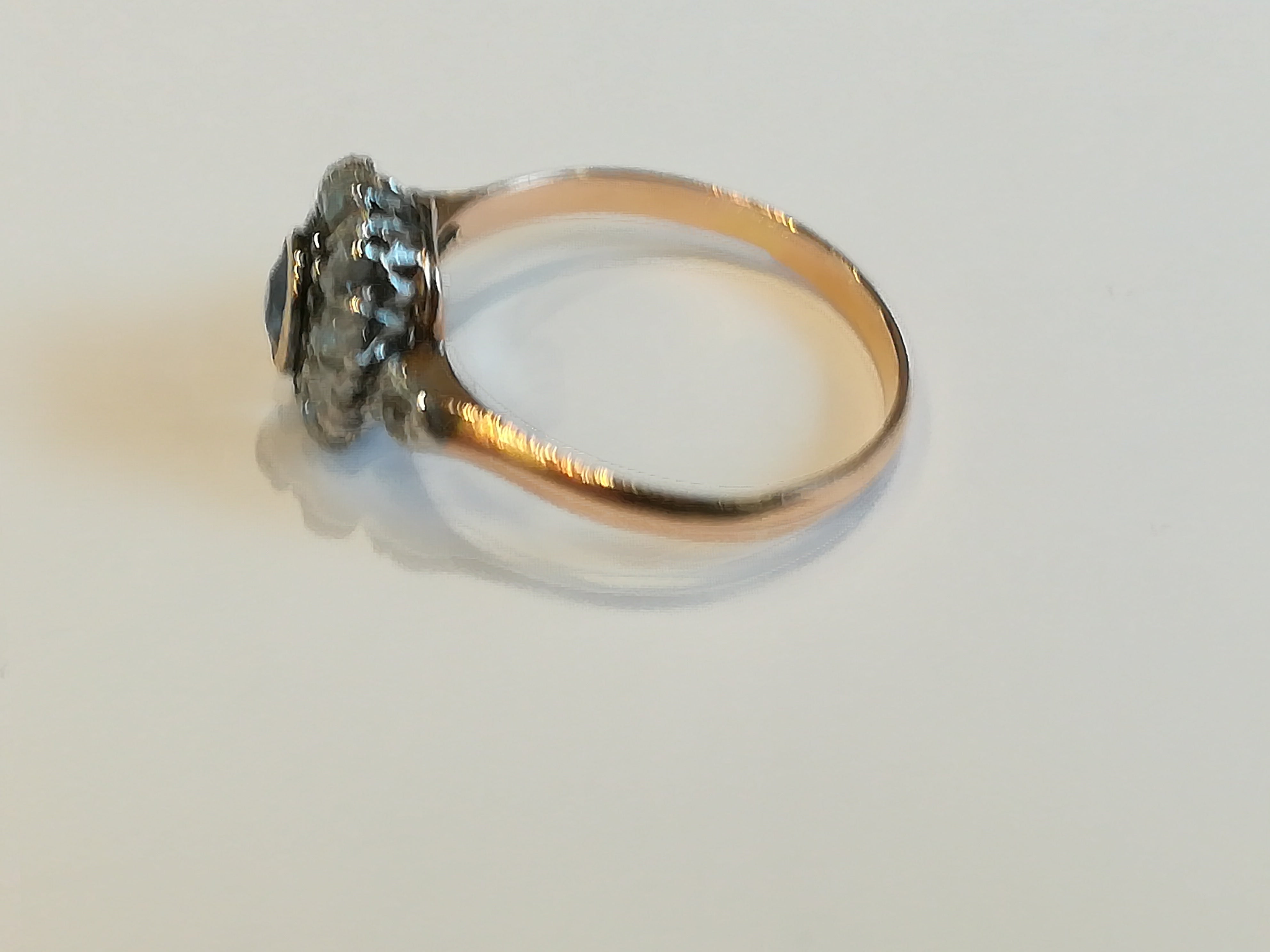 Ring in pink, paltinium, sapphire and diamonds.