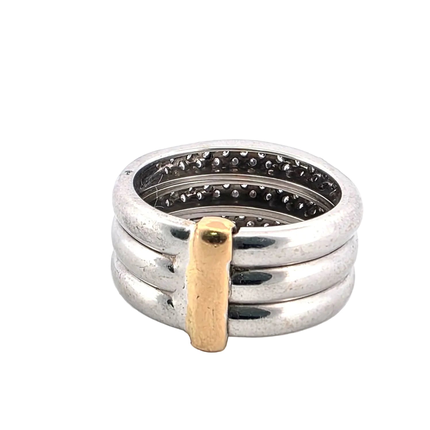 Ring Paved in white gold, yellow gold and diamonds.