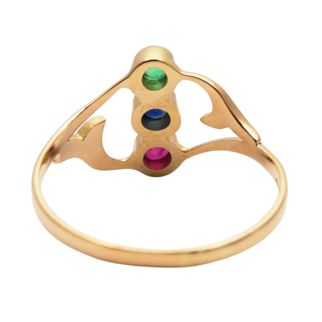 Trilogy Ring in yellow gold, emerald, sapphire, and ruby
