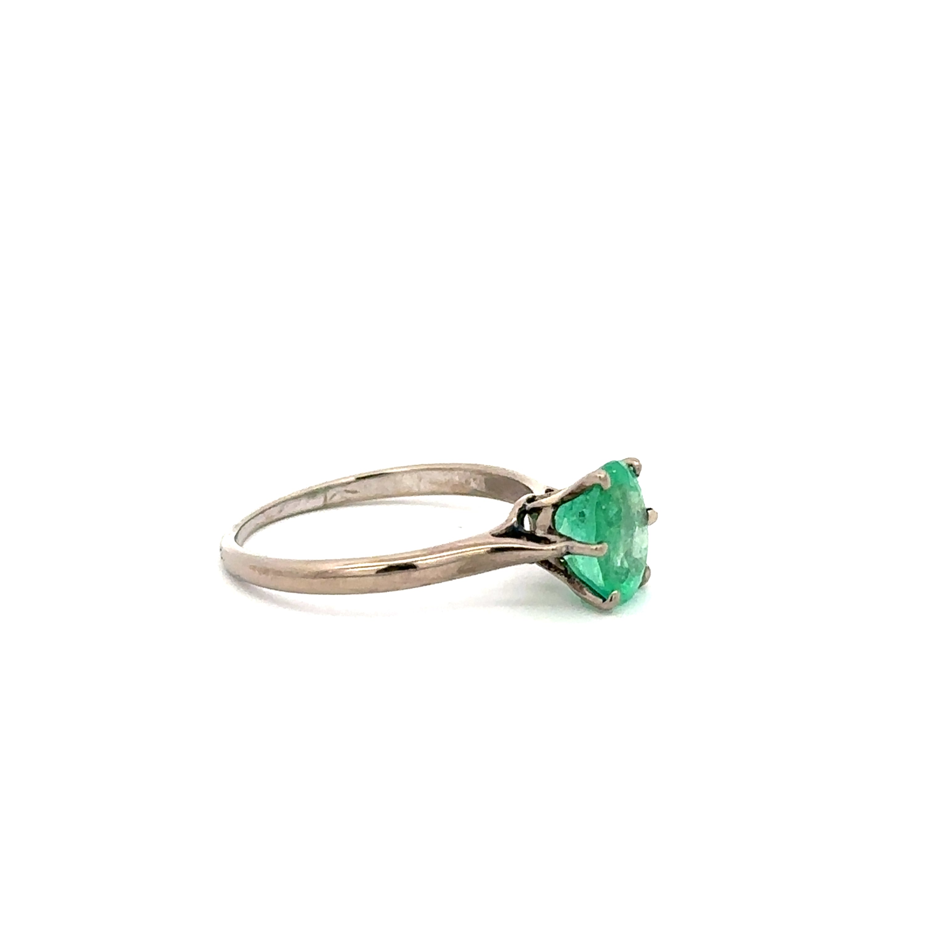White Gold and Emerald Solitaire Ring