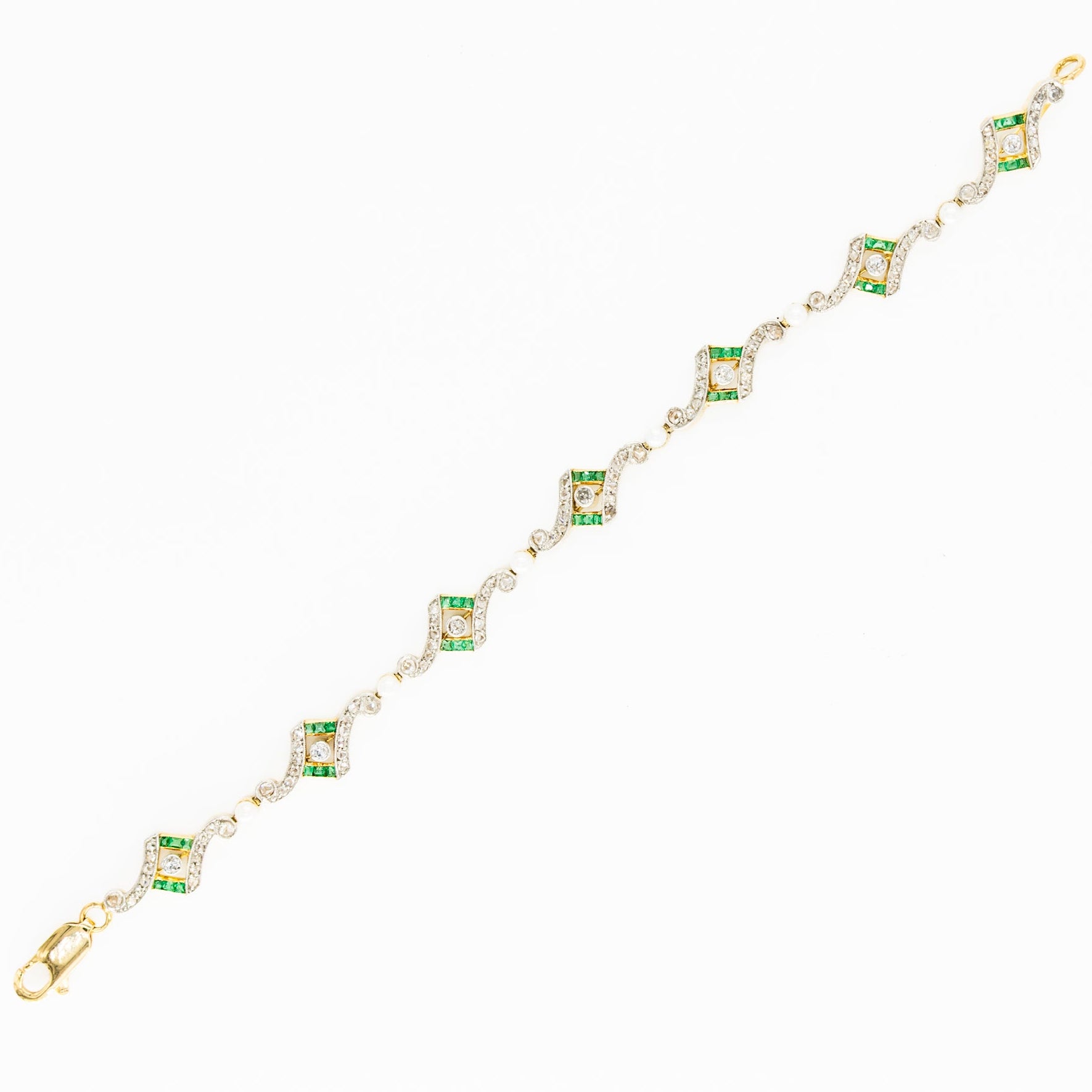 Art Deco bracelet in yellow gold, platinum, pearls, emeralds, and diamonds