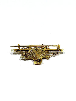 Brooch made of yellow gold, rose gold, and pearls